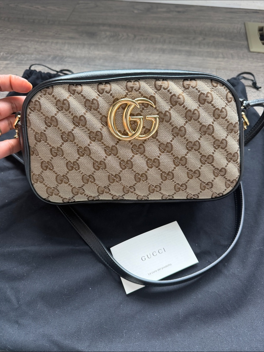 Pre-loved Gucci GG Marmont Small Camera Bag 
Canvas/Black